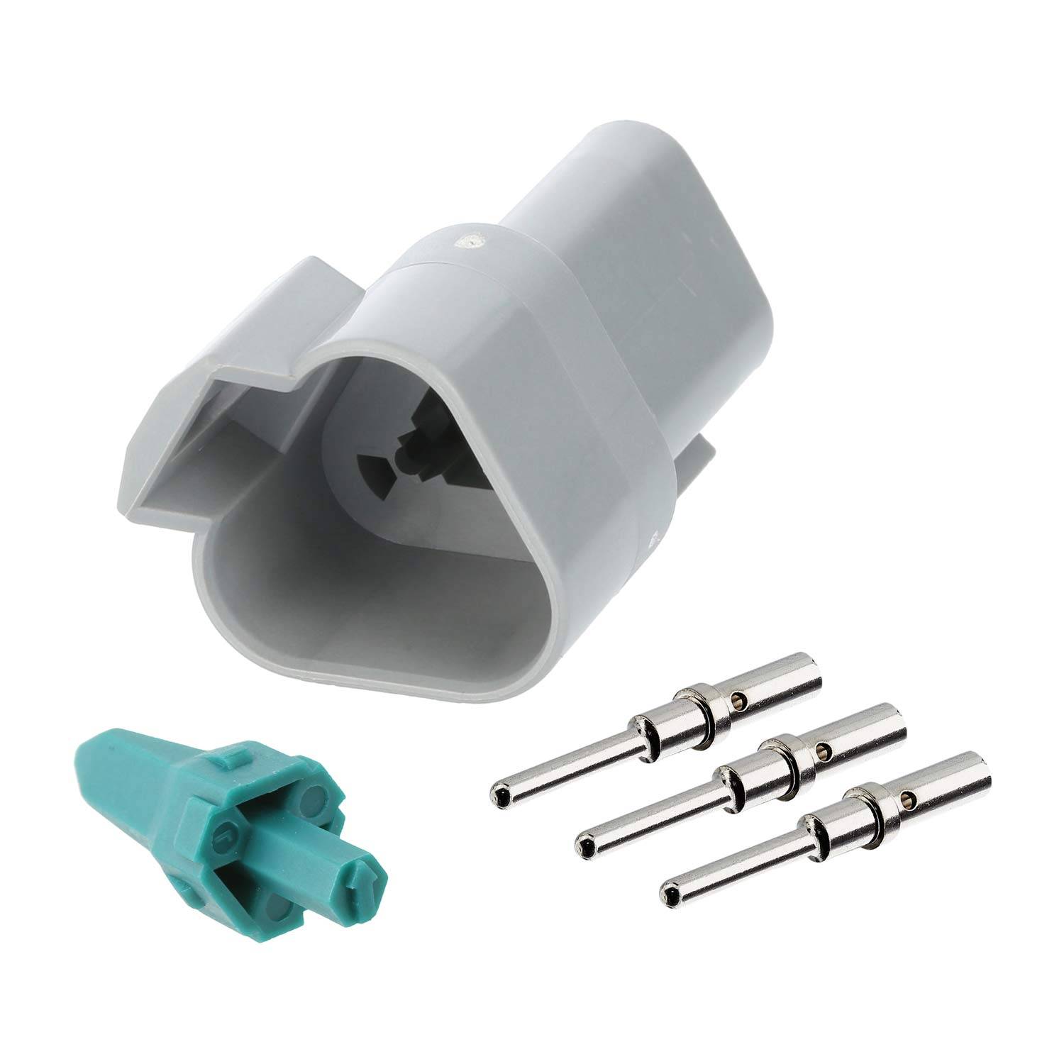 Ein graues elektrisches Anschlussgehäuse mit einem passenden grünen Einsatz und drei Metallkontaktstiften, verwendet für den Zusammenbau einer Leitungsverbindung.