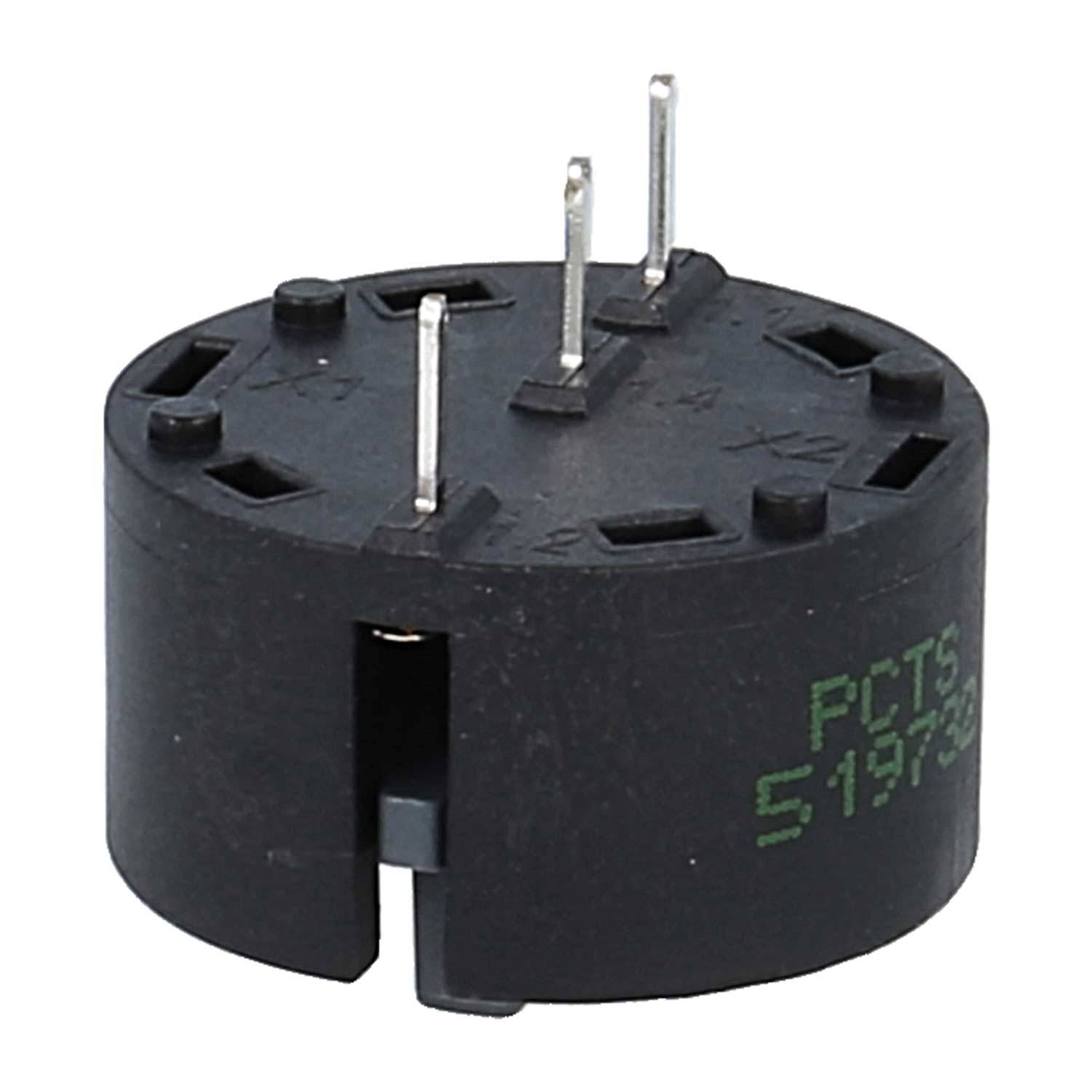 Eine schwarze kreisförmige Relaishalterung mit acht Metallstiften, die für elektrische Verbindungen in elektronischen Geräten verwendet wird.