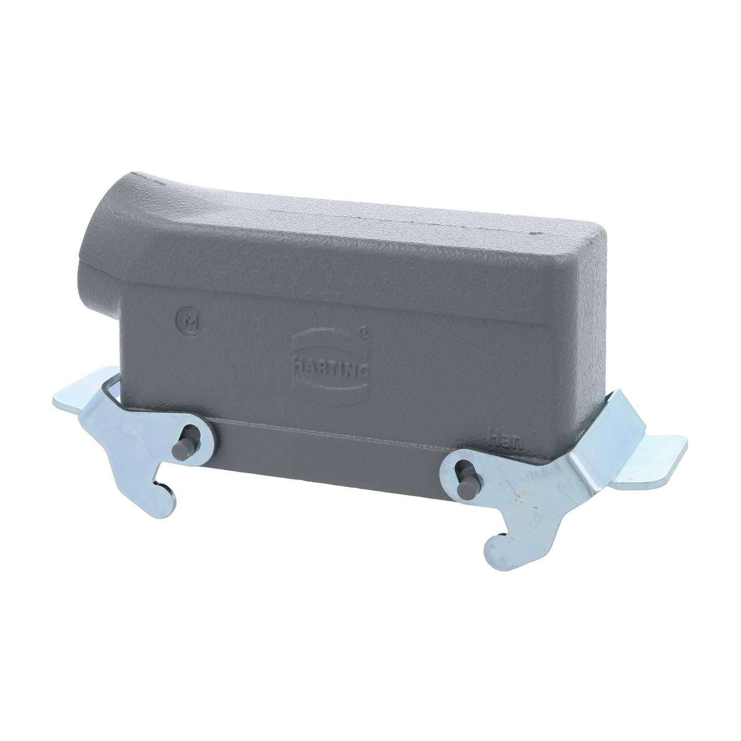 Rechteckiges Metallgehäuse mit zwei hervorstehenden Halterungen an beiden Seiten zur Befestigung, seitlich mit 'Harting' beschriftet.