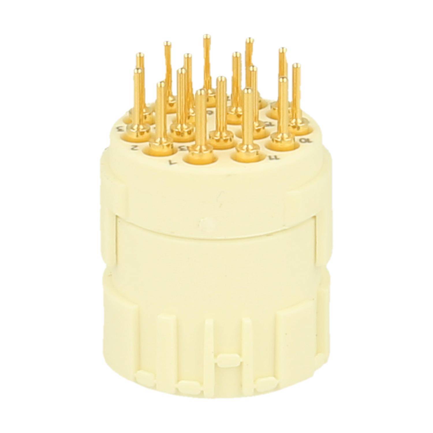 Eine beige zylindrische elektronische Komponente mit mehreren kleinen Goldstiften an der Oberseite, die in zwei kreisförmigen Reihen angeordnet sind.