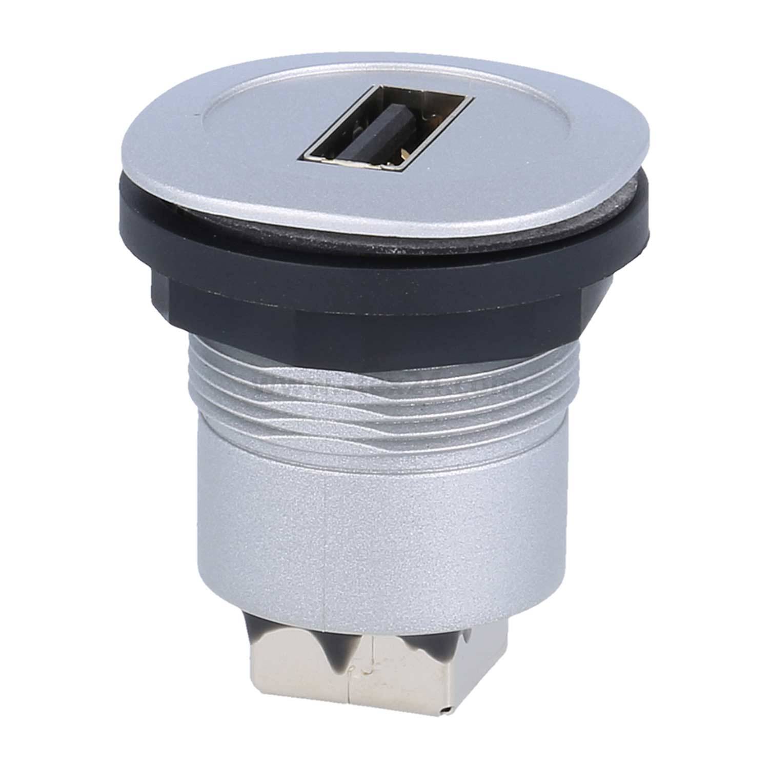 Eine silberne und schwarze USB-Buchse mit einem runden Befestigungsrahmen, die für die Paneelinstallation konzipiert ist.