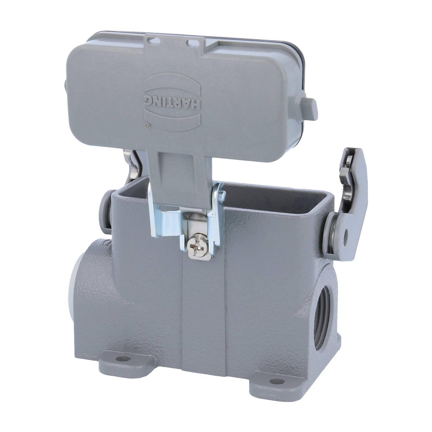 Graues rechteckiges Metallgehäuse für elektrische Anschlüsse mit offener Abdeckung; seitliche Scharniere; mit Harting-Beschriftung; verwendet für industrielle Verbindungen.