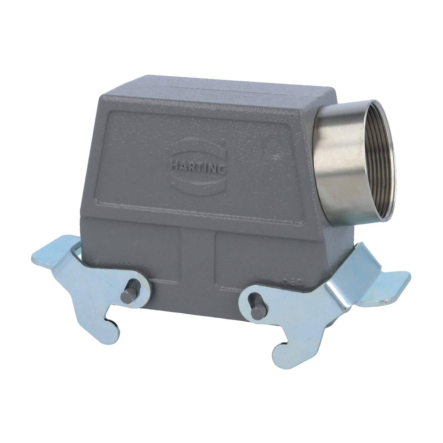 Eine rechteckige metallische industrielle Anschlusshaube mit einem kreisförmigen Befestigungspunkt, auf deren Seite der Markenname 'Harting' eingeprägt ist.