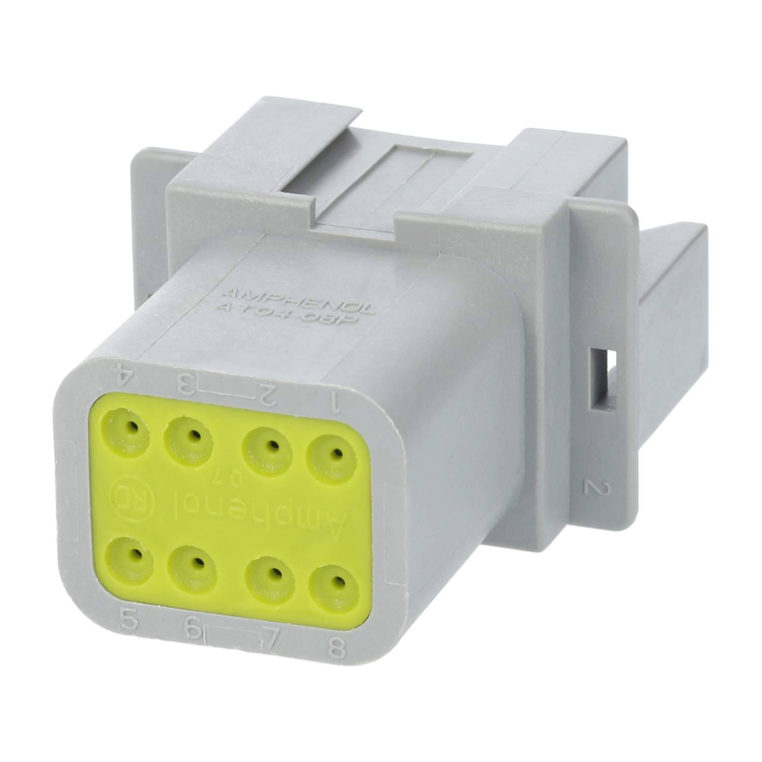 Ein sechspoliger elektrischer Anschluss mit einem grauen Gehäuse und einer gelben Schnittstelle.