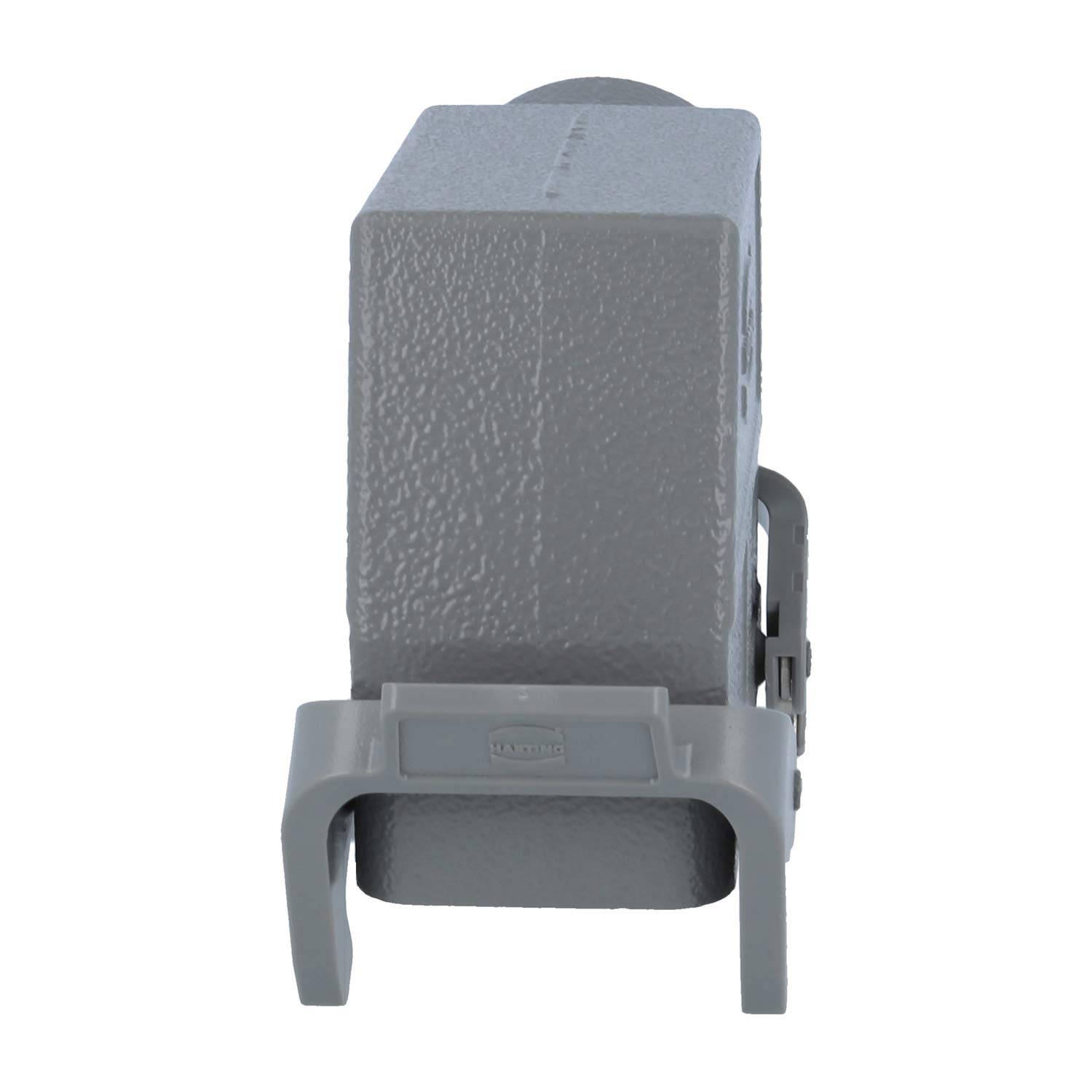 Ein grauer Kunststoff-Wandverbinder mit einer Klemme, der für elektrische Anschlüsse und Installationen verwendet wird, von der Seite dargestellt.