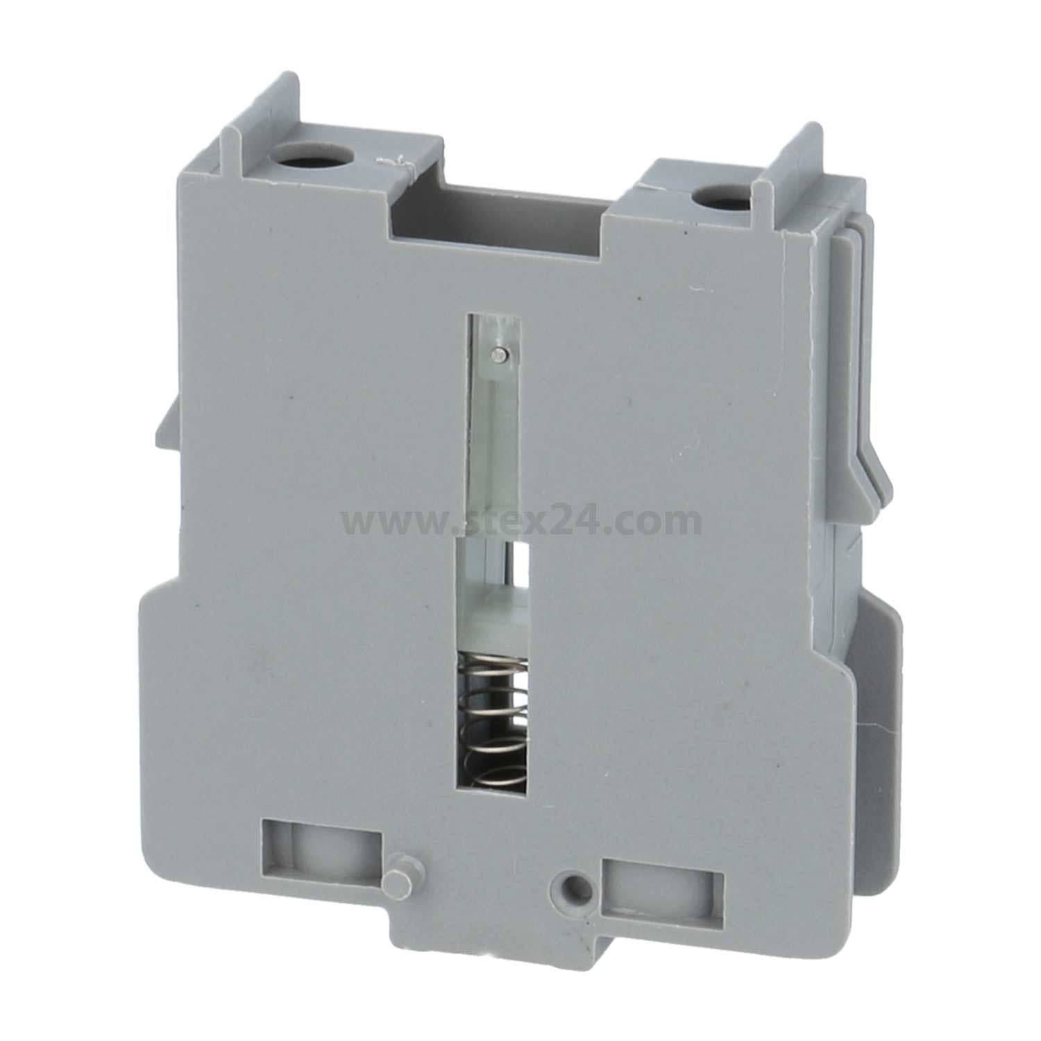 Graues Kunststoffgehäuse mit einem sichtbaren Federmechanismus in der Mitte, höchstwahrscheinlich eine Komponente für ein elektrisches oder mechanisches Gerät.