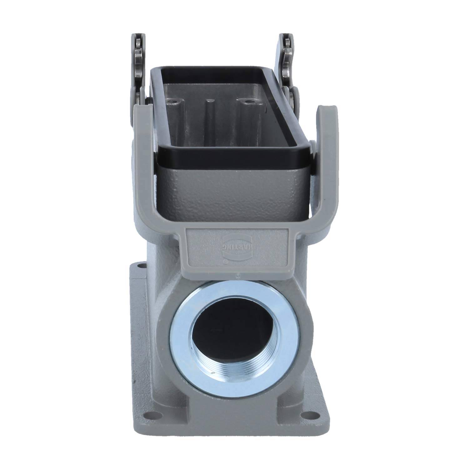 Ein grauer industrieller Anschluss mit einer zylindrischen Öffnung und angebrachten Scharnieren, verwendet für elektrische oder mechanische Verbindungen.