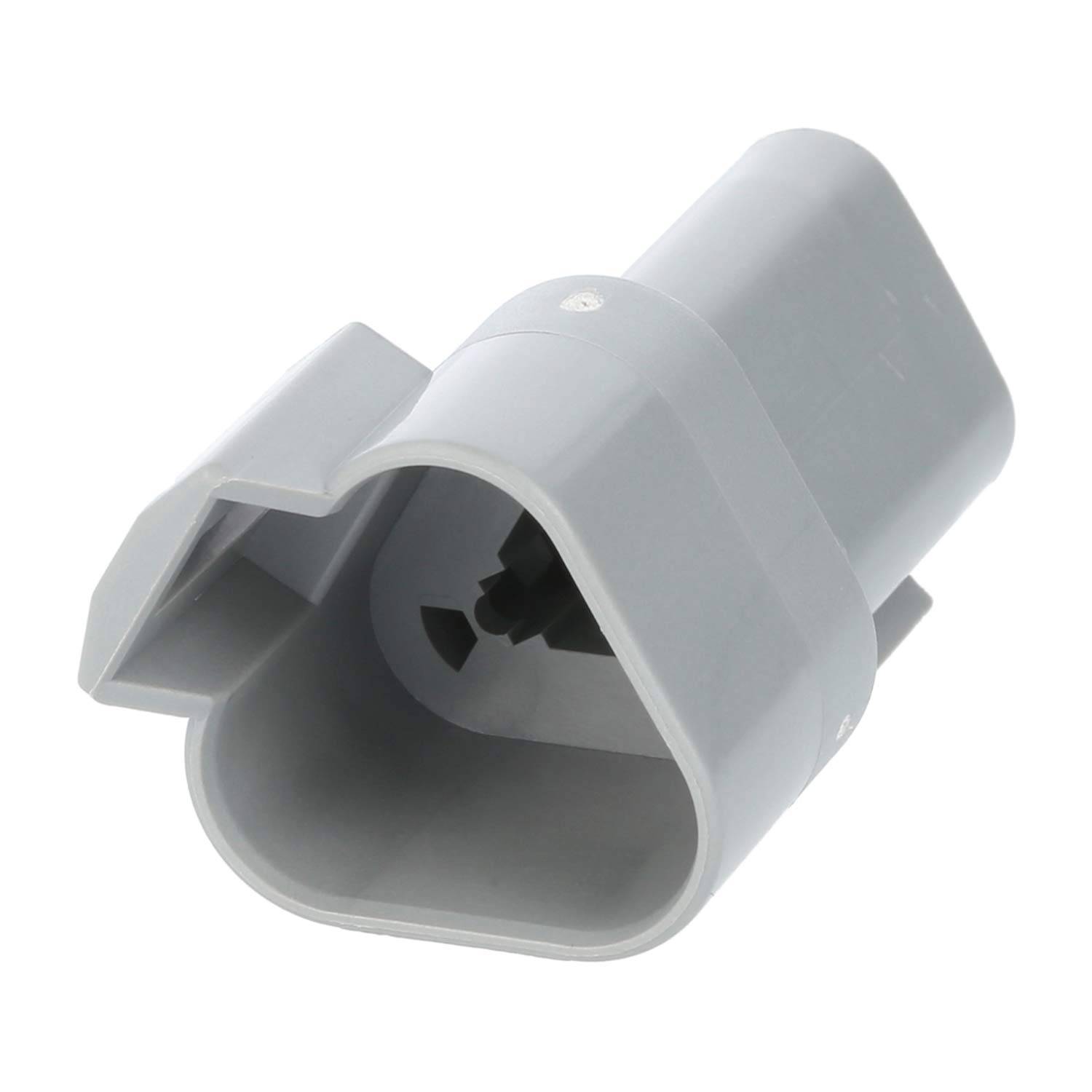 Graues Plastikgerät mit einer hohlen, abgerundeten rechteckigen Form und einem kleinen Tab an der Seite. Wird zur Befestigung von Kabeln oder ähnlichen Gegenständen verwendet.