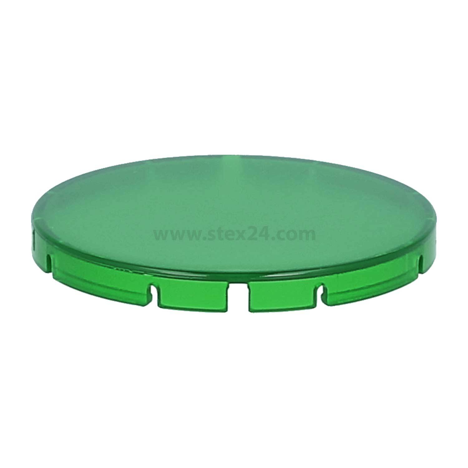 Ein grüner runder Kunststoffdeckel mit kleinen Einschnitten um den Rand.