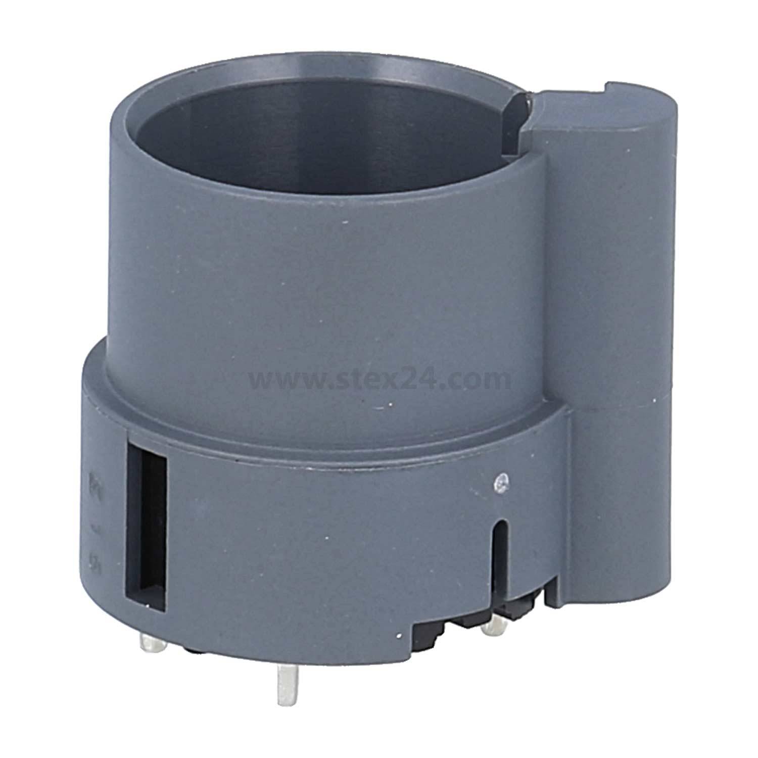 Eine graue, zylindrische elektronische Komponente mit mehreren Pins an der Basis, höchstwahrscheinlich eine Buchse oder ein Verbinder, vor einem einfarbigen Hintergrund.