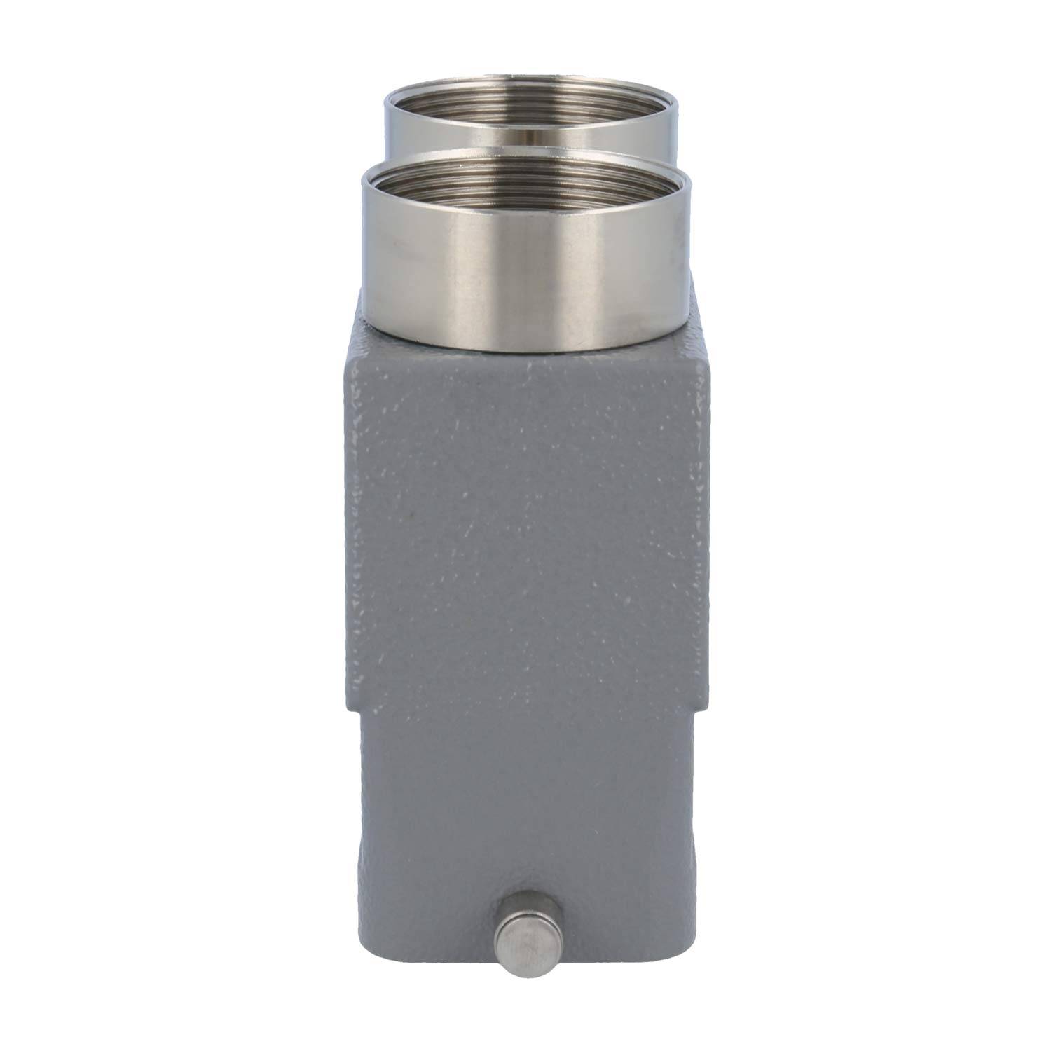 Graue industrielle Metallarmaturen mit zwei kreisförmigen Öffnungen an der Oberseite, konstruiert für Rohranschlüsse oder ähnliche Anwendungen.