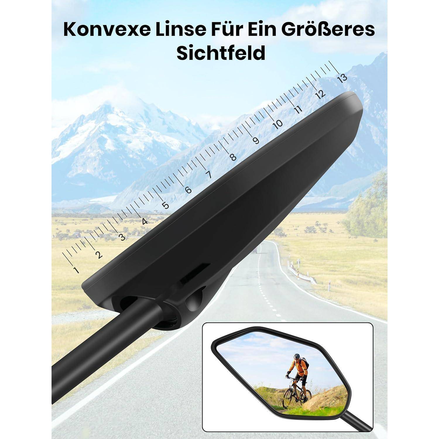 Ein Radfahrer fährt auf einer malerischen Straße mit Bergen im Hintergrund, die sich in einem Rückspiegel spiegeln, über dem eine Maßstabsskala angebracht ist. Der deutsche Text lautet: 'Konvexe Linse Für Ein Größeres Sichtfeld'.