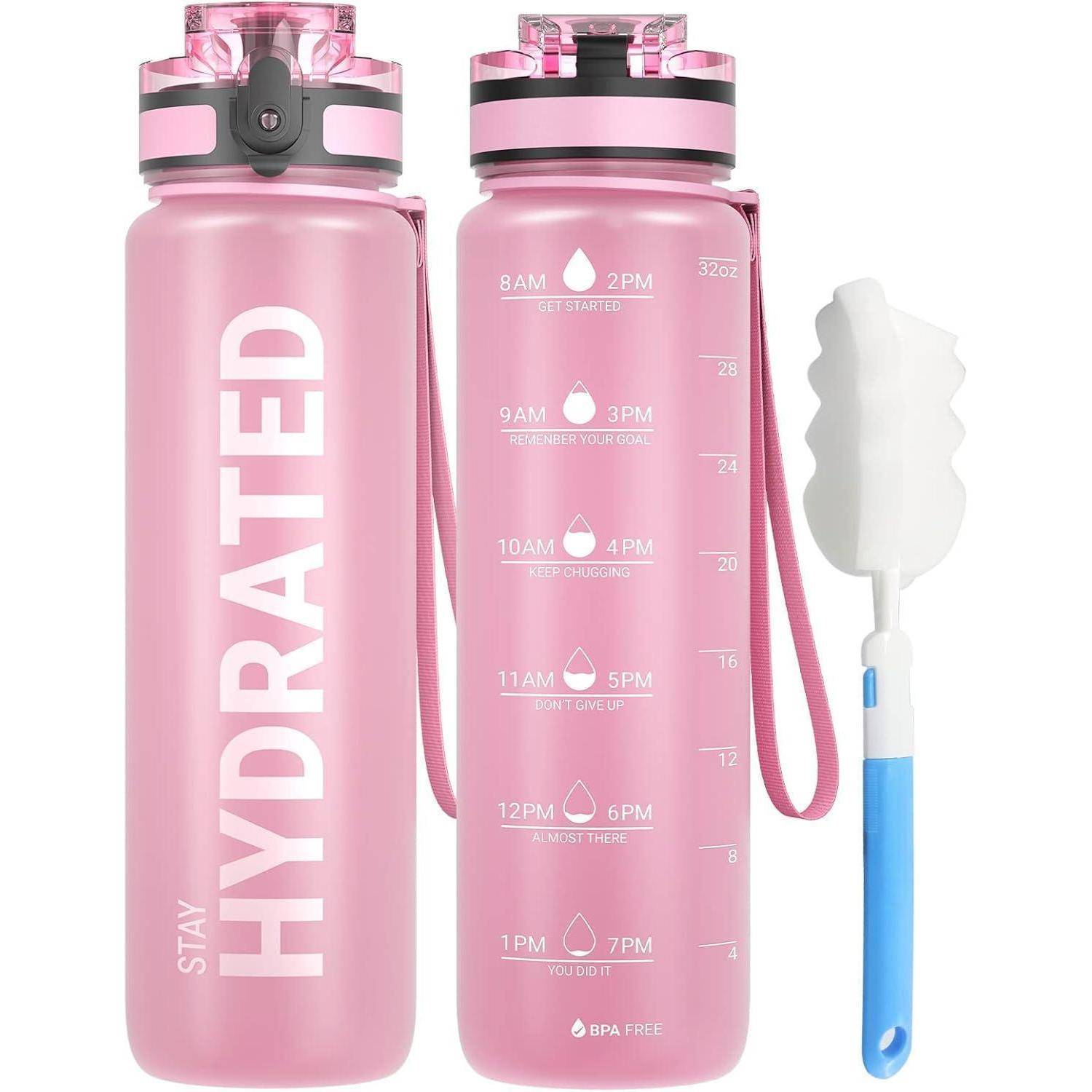 Rosa Wasserflasche mit Zeitmarkierungen und motivierenden Texthinweisen wie „Bleib hydriert