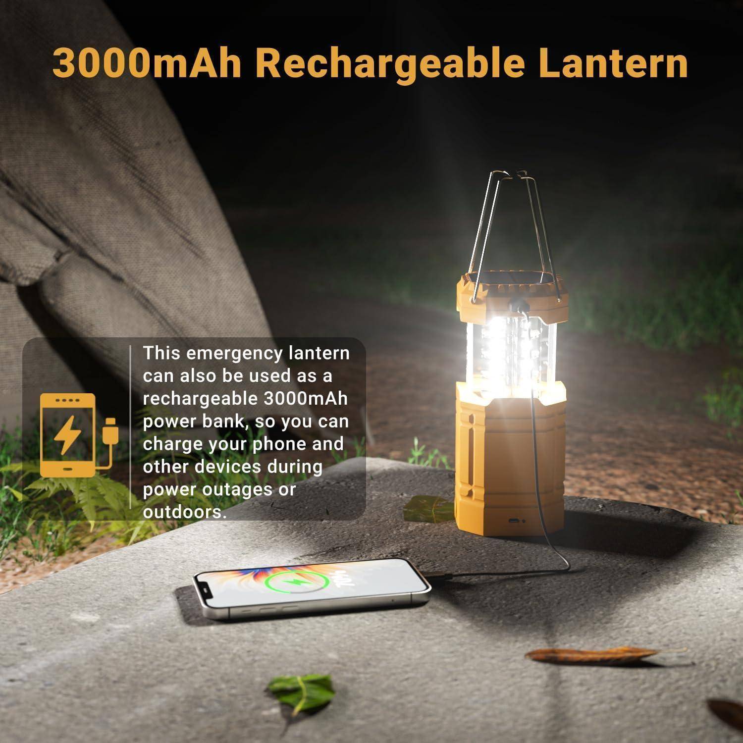 Eine beleuchtete aufladbare Laterne auf einem Felsen ist zu sehen, neben der ein Handy drahtlos lädt und damit die Powerbank-Funktion demonstriert.