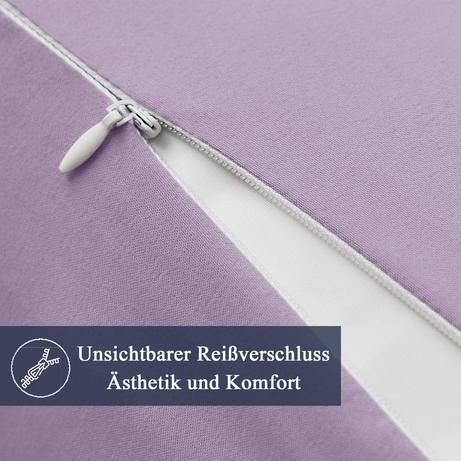 Eine Nahaufnahme eines lila Stoffs mit einem weißen Reißverschluss, der teilweise geöffnet ist und das Etikett ‚Unsichtbarer Reißverschluss Ästhetik und Komfort' freilegt.