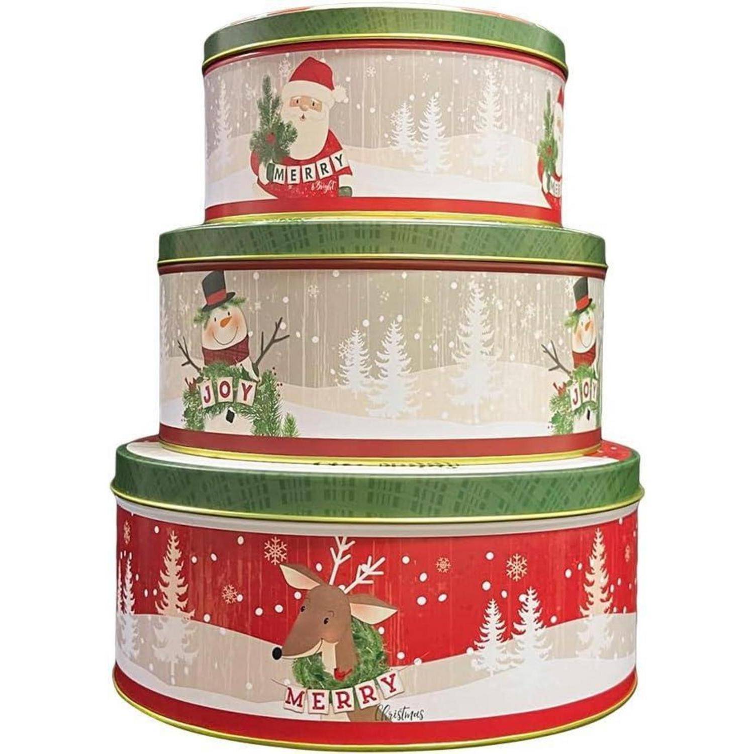 Drei gestapelte Geschenk-Blechdosen mit festlichen Illustrationen: eine Dose mit Weihnachtsmann, markiert mit ‚Fröhlich', eine Dose mit einem Schneemann und der Aufschrift ‚Freude', und eine Dose mit einem Rentier, beschriftet mit ‚Fröhlich'.