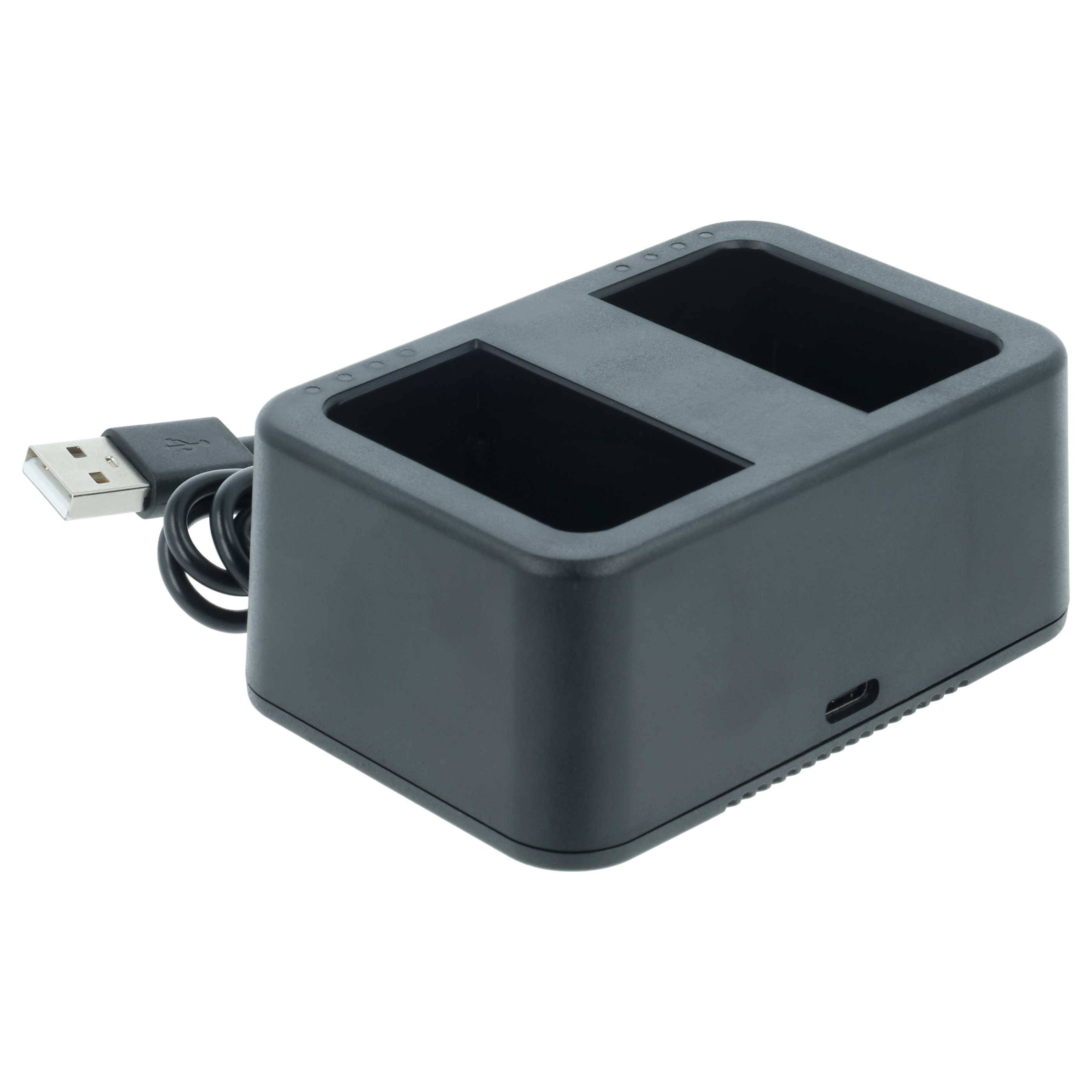 Ein schwarzer Dual-Bay-Ladegerät mit einem USB-Kabel, der zum gleichzeitigen Laden von zwei Batterien entwickelt wurde, vor einem weißen Hintergrund.