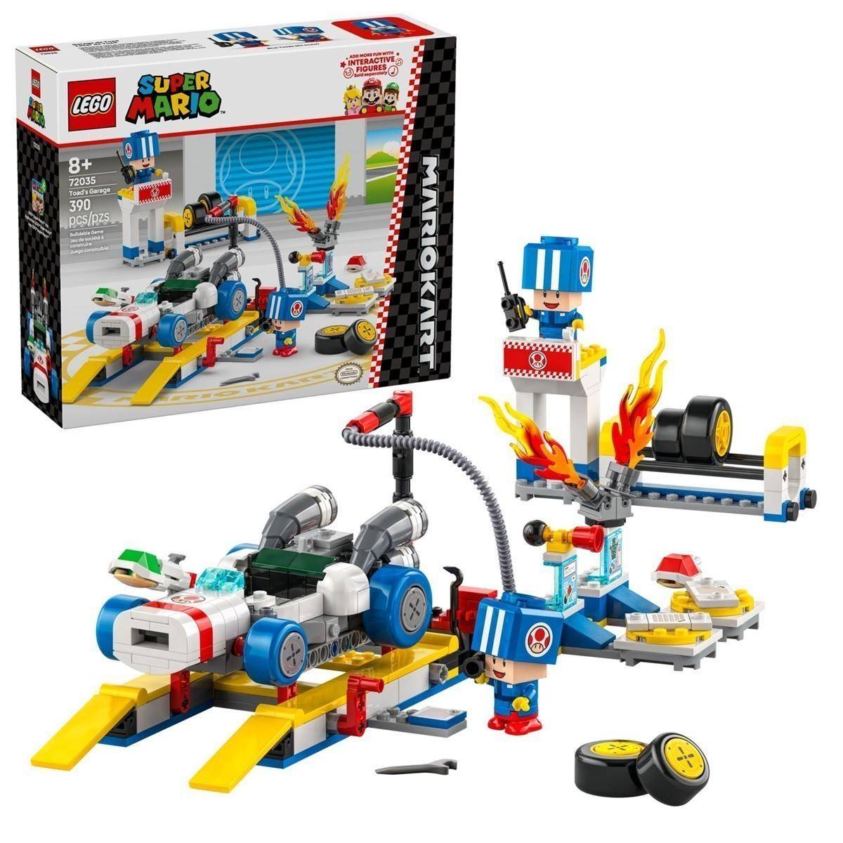 LEGO Super Mario Set mit einer Spielzeugauto-Rennstrecke, zwei LEGO-Figuren, Zubehör und einer Schachtel neben dem zusammengebauten Modell.