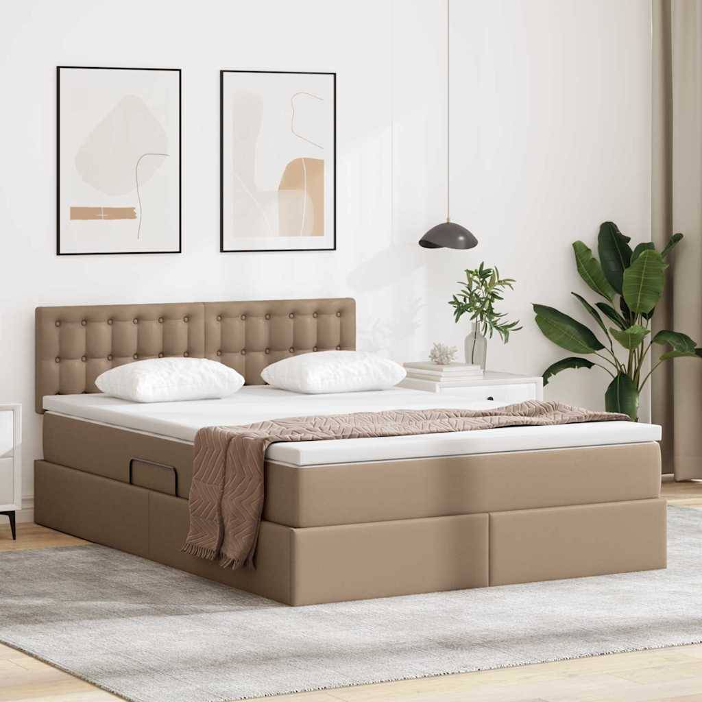 Ein modernes Schlafzimmer verfügt über ein beigefarbenes Bett mit gepolstertem Kopfteil, zwei Kissen und einer braunen Wurfdecke. Zwei abstrakte Gemälde hängen über dem Bett, und eine Topfpflanze steht in der Ecke.