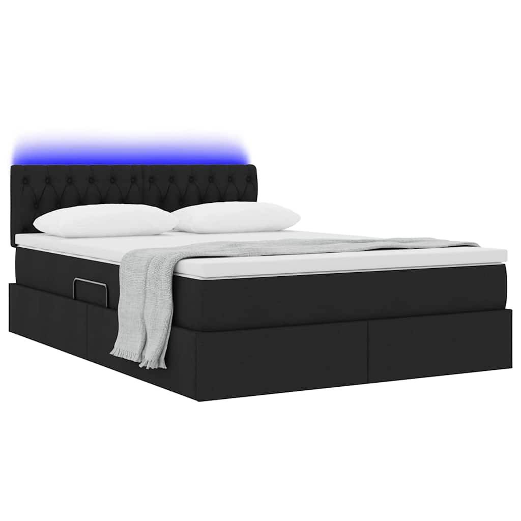 Ein modernes schwarzes Bett mit strukturiertem Kopfteil, weißer Bettwäsche und einer grauen Decke. Das Kopfteil ist mit blauer Umgebungsbeleuchtung ausgestattet.