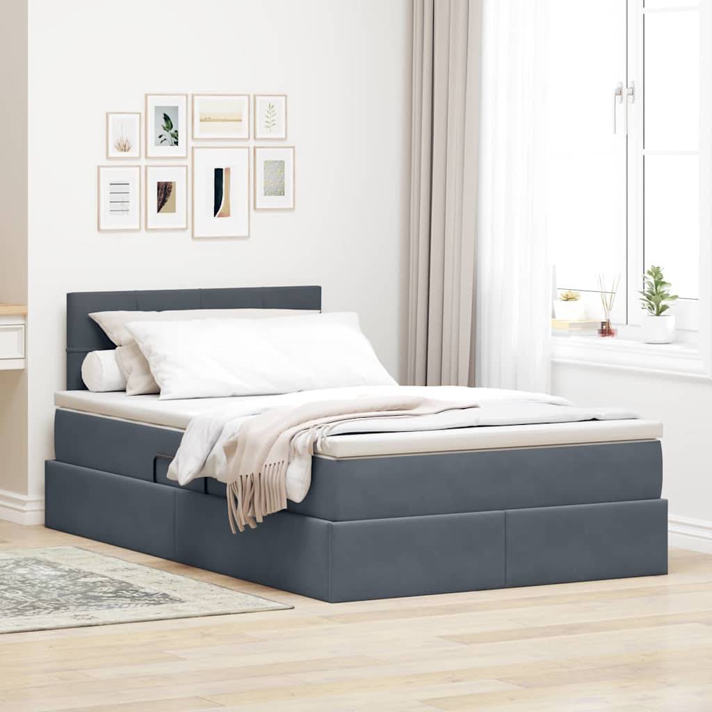Ein minimalistisches Schlafzimmer mit einem grauen Podestbett, das mit weißer Bettwäsche ausgestattet ist, einem hellen Teppich und rahmengerahmter Kunst an der Wand, in der Nähe eines gut beleuchteten Fensters.