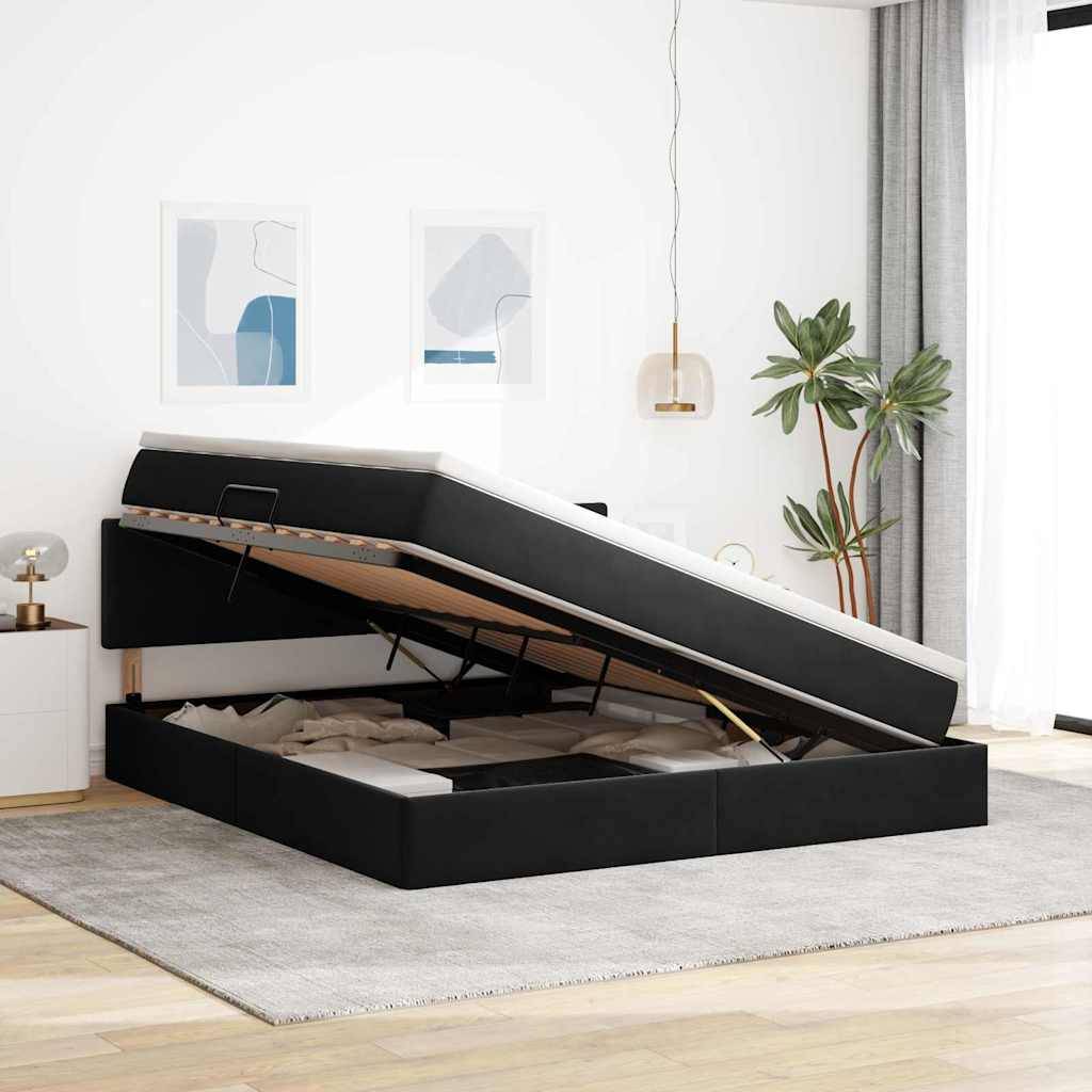 Ein modernes Schlafzimmer zeigt ein schwarzes Bett mit Hubbettfunktion auf einem grauen Teppich, unter sanfter Beleuchtung mit zwei abstrakten Kunstwerken an der Wand.