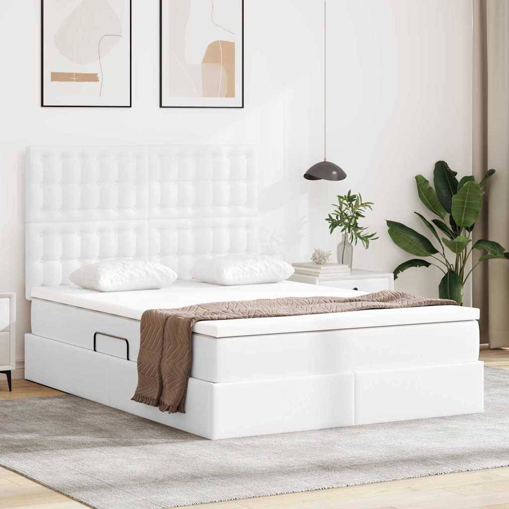 Ein modernes Schlafzimmer mit einem weißen Bett mit Schubladen für Stauraum, zwei Kissen, einer beigefarbenen Decke, Topfpflanzen und abstrakter Kunst an den Wänden.