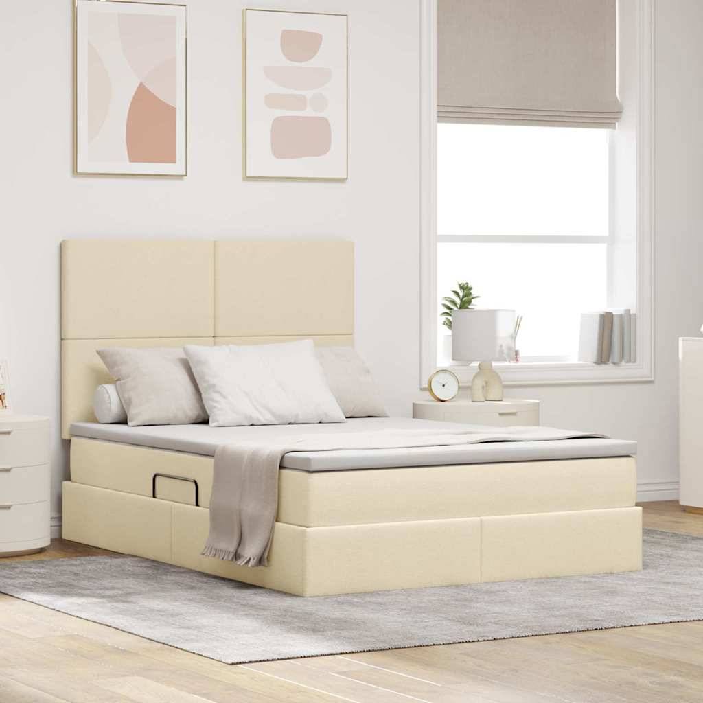 Ein modernes Schlafzimmer verfügt über ein beiges gepolstertes Bett mit einer grauen Decke und weißen Kissen. Ein Nachttisch mit einer Lampe steht neben dem Bett.