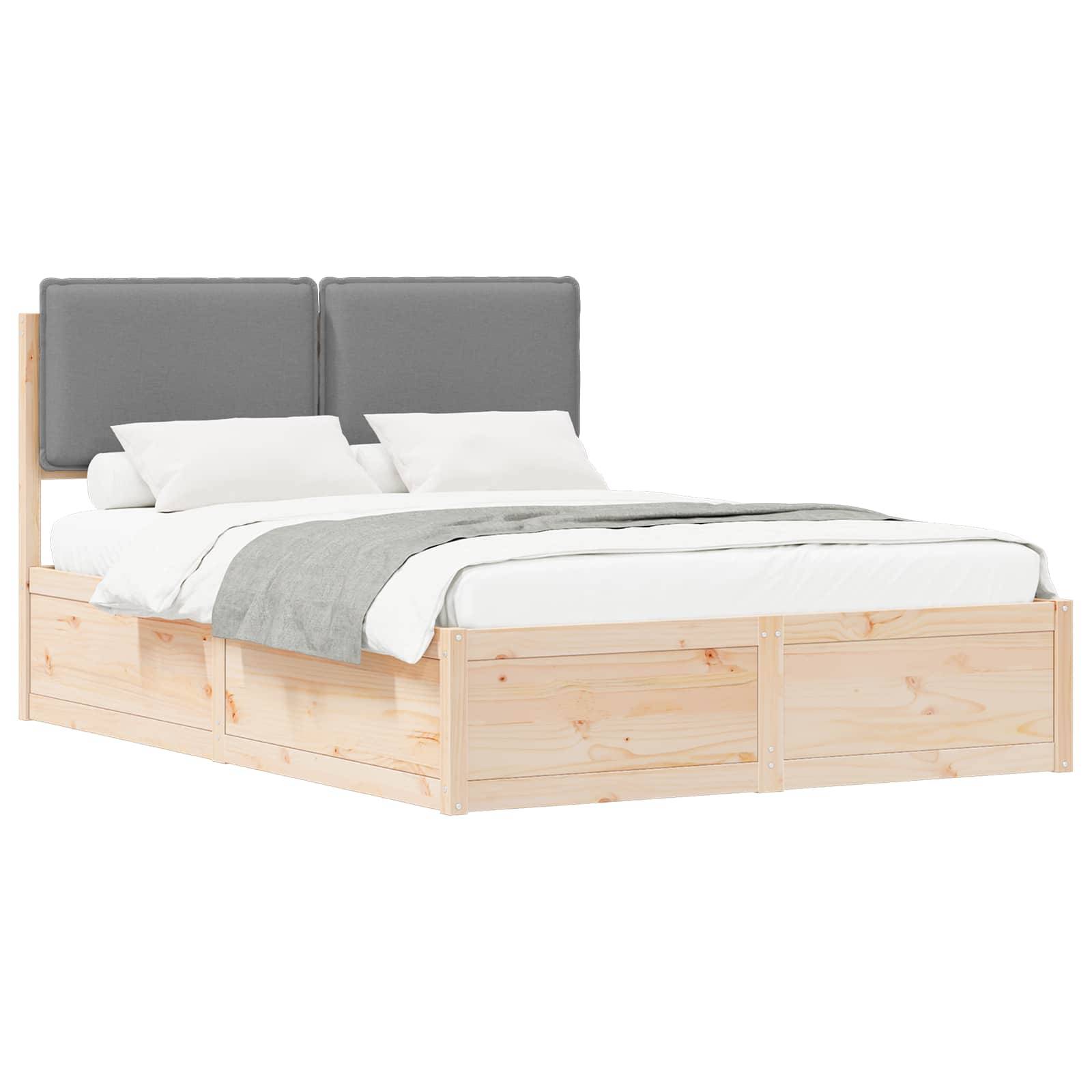 Holzbettgestell mit grauem gepolstertem Kopfteil, weißer Bettwäsche und grauer Decke. Das Bett verfügt über Schubladen zur Aufbewahrung unter dem Bett.