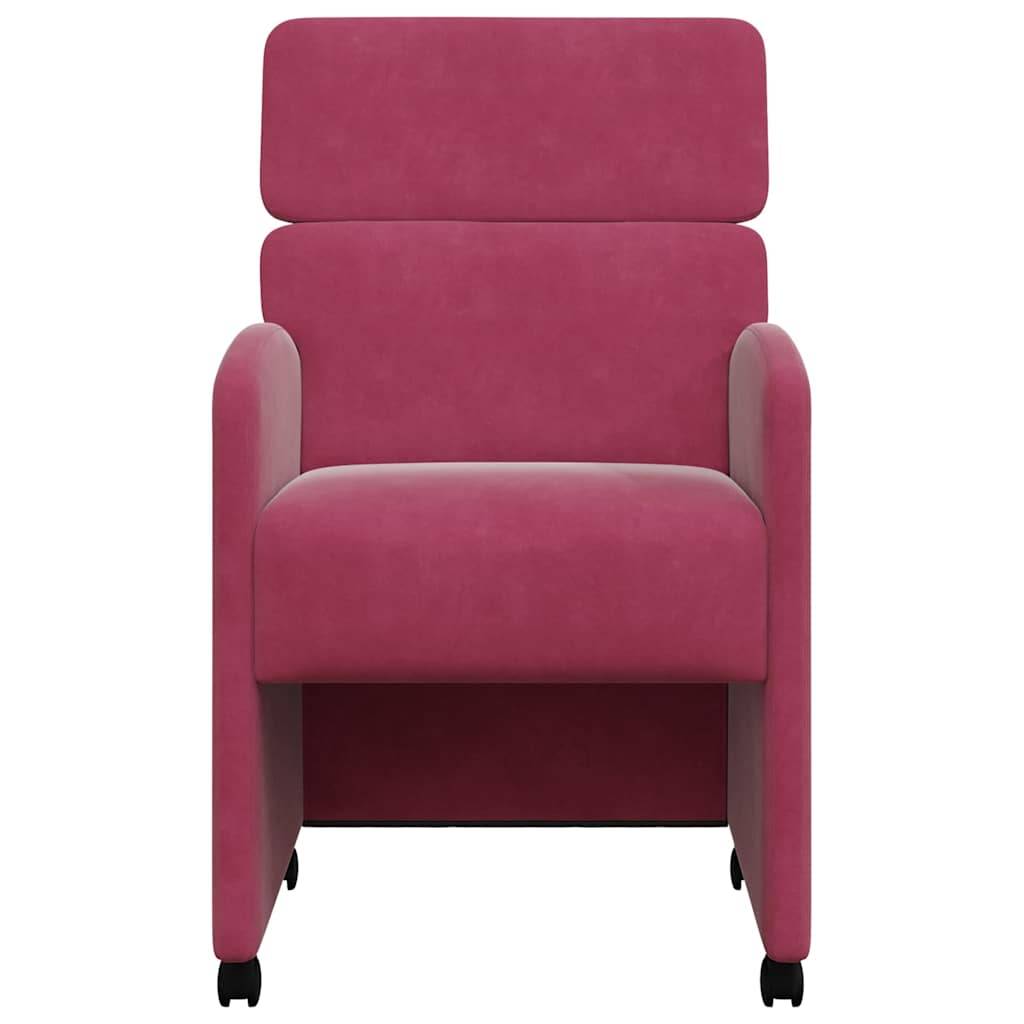 Ein kuscheliger, moderner rosa Stuhl auf kleinen Rollen, Frontansicht.