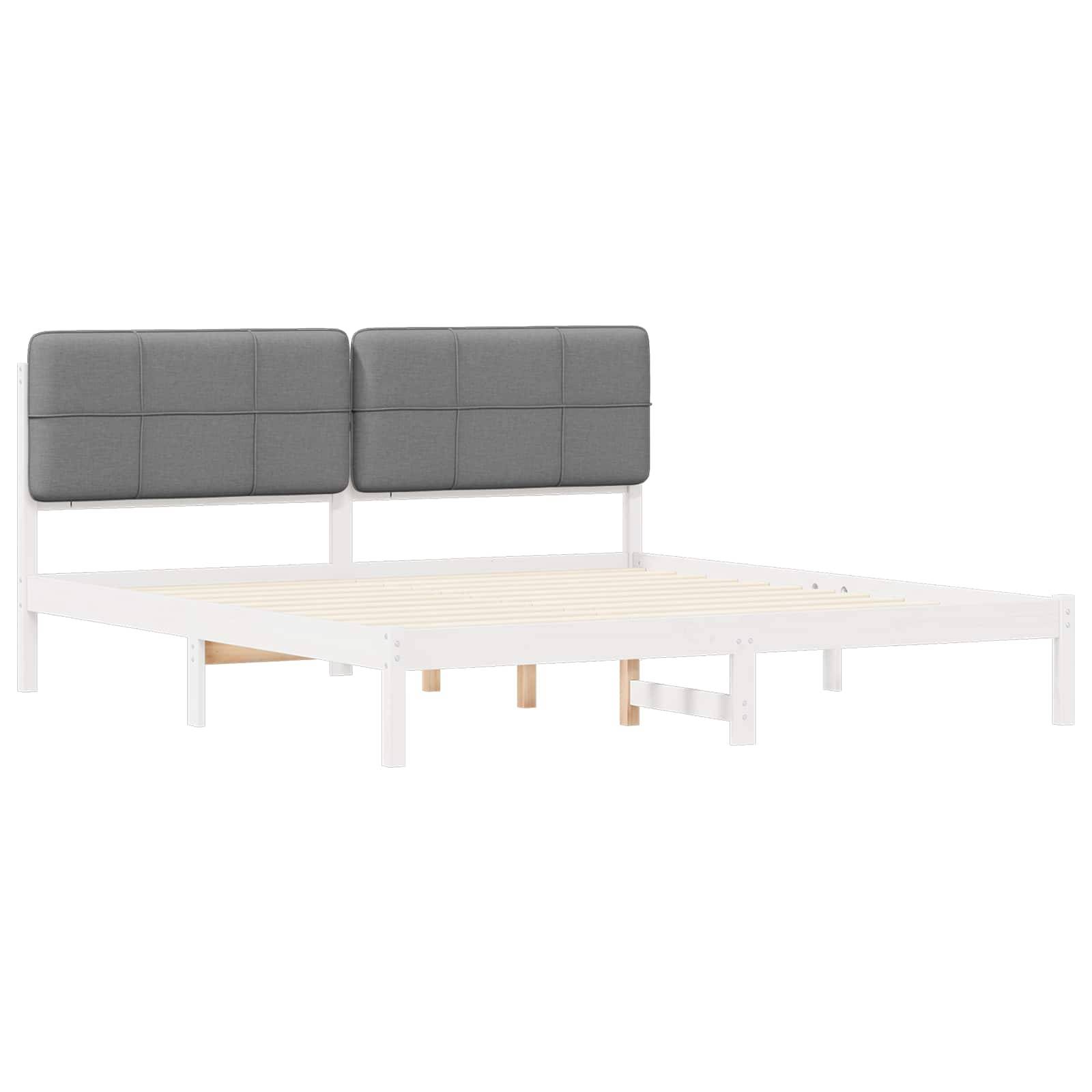 Ein weißer Holzbettrahmen mit zwei grauen gepolsterten Kopfteilen, in einem minimalistischen Stil ohne Matratze.