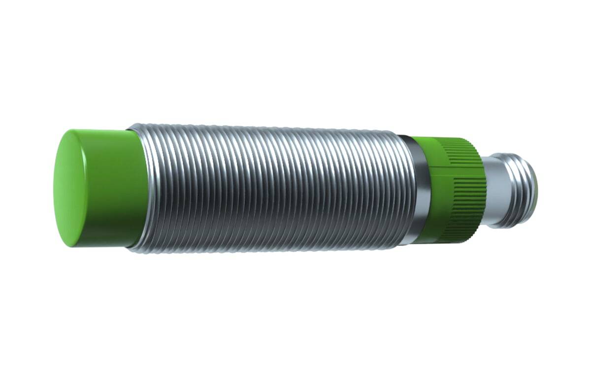 Ein grünes, metallisches Zylinderobjekt, das einem Sensor oder mechanischen Bauteil ähnelt, mit gerippter Oberfläche und einem verschraubten Mittelteil.