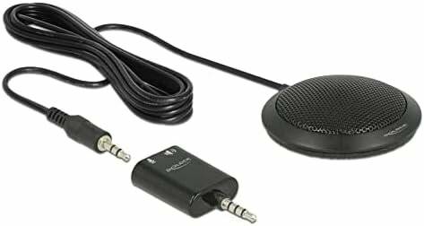 Ein rundes Mikrofon mit einem langen Kabel und einem kleinen rechteckigen Adapter mit zwei Audioklinkenbuchsen, das einen kompakten Audioaufbau präsentiert.