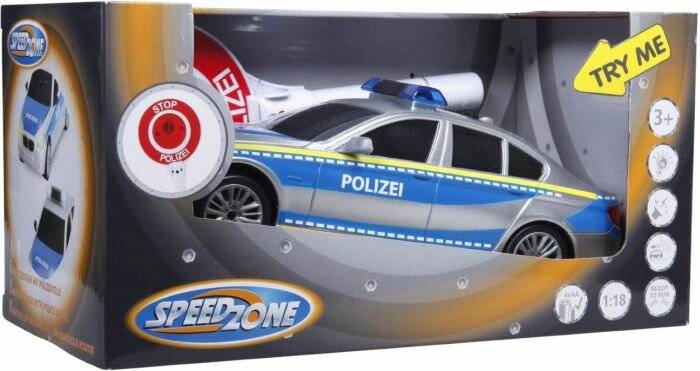 Ein Spielzeugmodell eines Polizeiautos in einer Verpackung mit der Aufschrift 