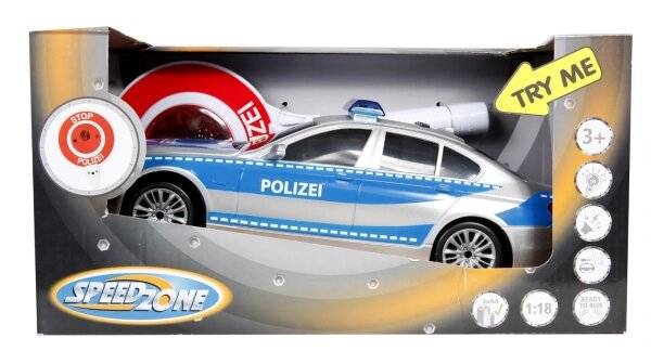 Ein Spielzeugmodell eines blauen und silbernen deutschen Polizeiwagens in einer Verpackung mit der Aufschrift 