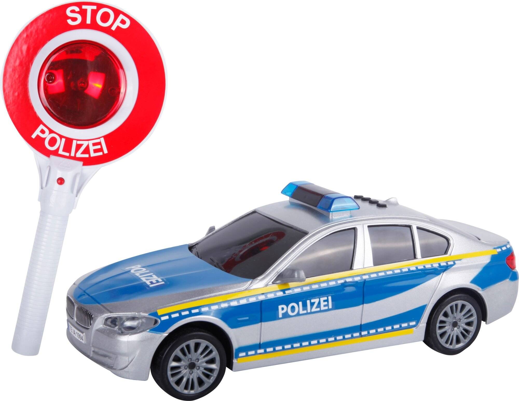 Ein Spielzeug-Polizeiauto und ein Stoppschild, beide mit der Aufschrift 