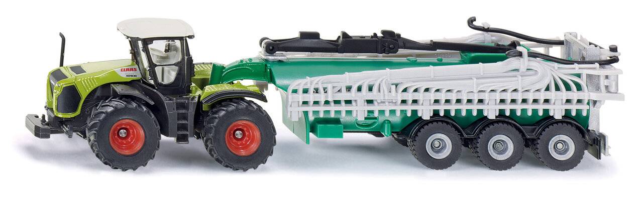 Ein detailliertes Modell einer grünen Landmaschine mit roten Reifen und weißen Anbauteilen, das das Design von landwirtschaftlichen Geräten hervorhebt.
