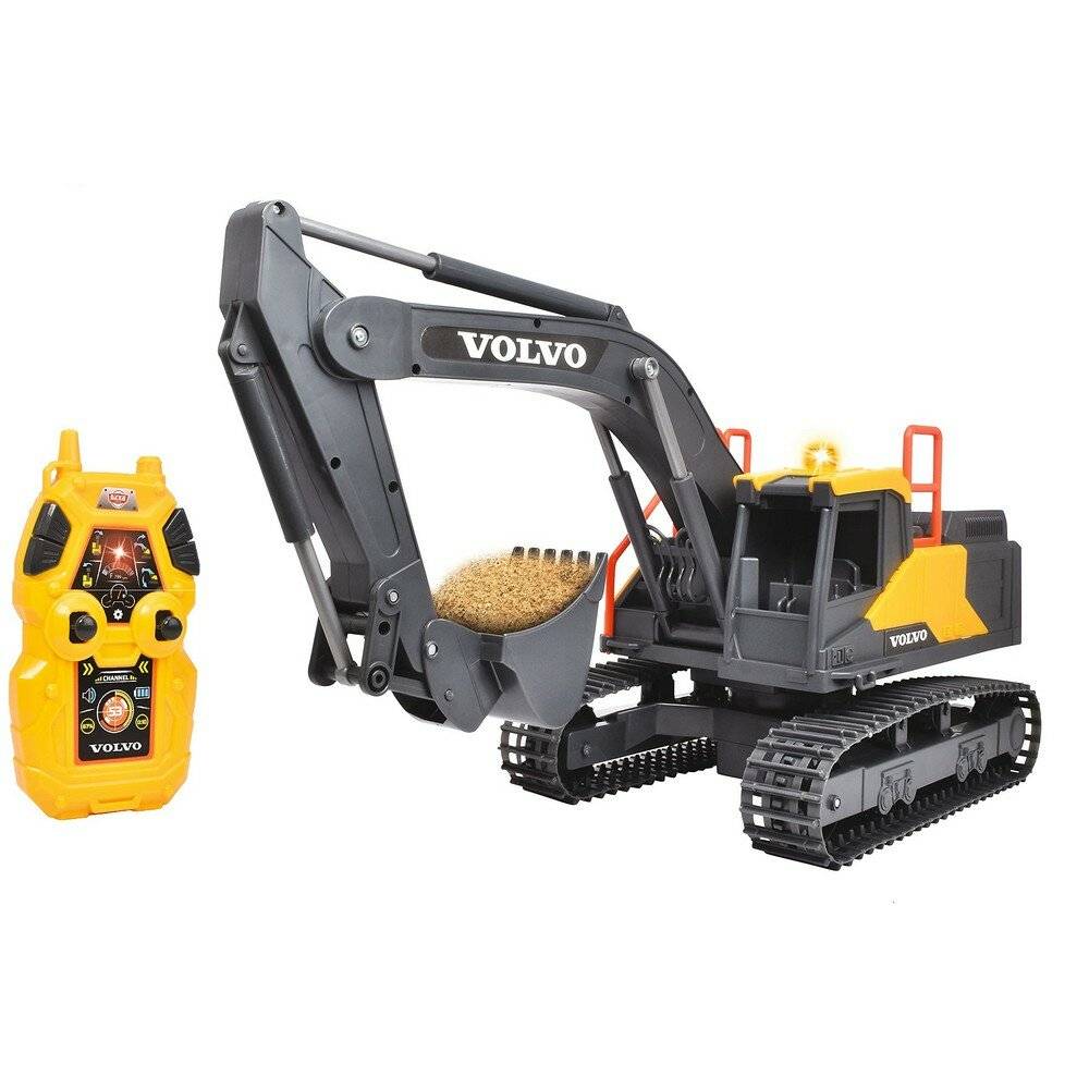 RC-Bagger-Spielzeug mit einer gelben Fernbedienung daneben. Der Bagger hat einen grauen Ausleger und Löffel sowie eine sichtbare Markenbezeichnung an der Seite.