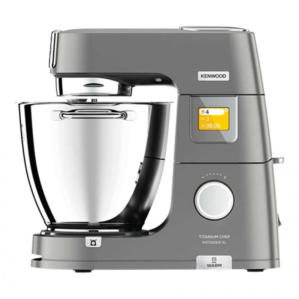 Silberner Kenwood Küchenmaschine mit digitalem Display, das '4' Minuten, Geschwindigkeit '3' und 'WARM' anzeigt. Ausgestattet mit einer großen Edelstahl-Rührschüssel.