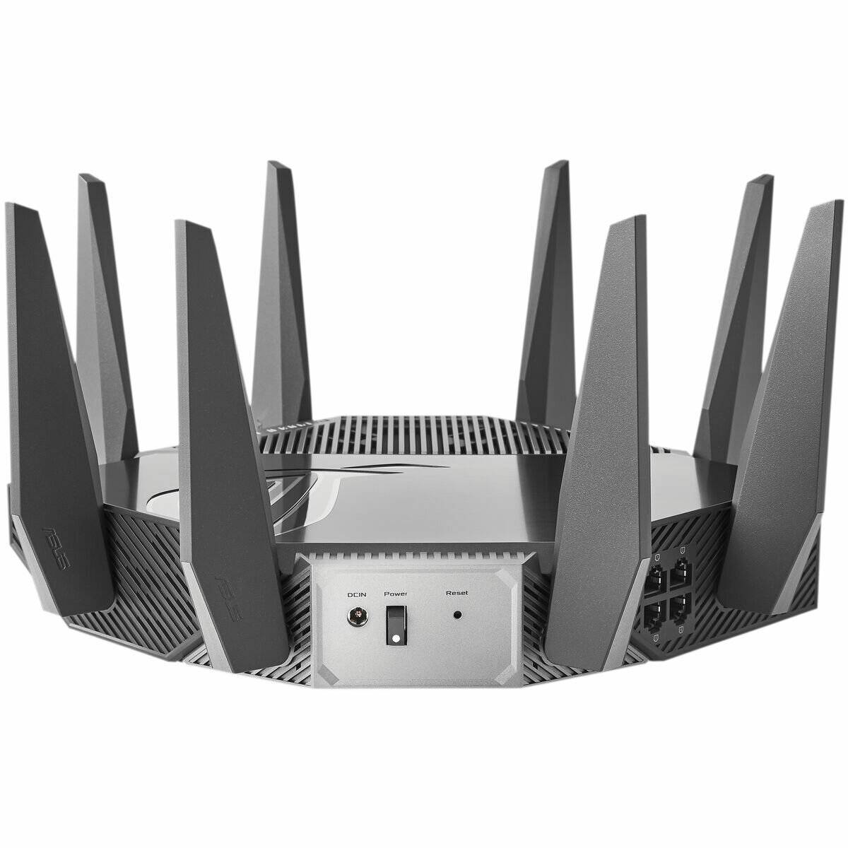 Ein schwarzer und grauer High-Performance-Wireless-Router mit mehreren externen Antennen, von hinten gezeigt, um Anschlüsse und Tasten zu präsentieren.