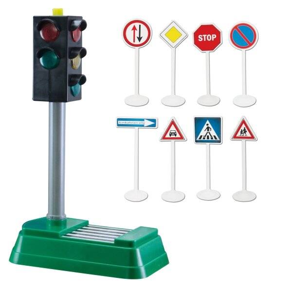 Spielampel und neun Miniatur-Verkehrszeichen, einschließlich Stopp, Parkverbot, Fußgängerüberweg und andere Straßensymbole.
