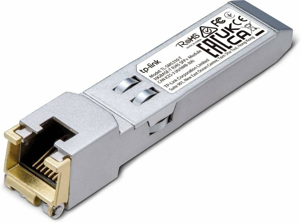 TP-Link SFP+ Modul, Modell TXM431-SR, von oben dargestellt. Das Modul enthält Sicherheits- und Zertifizierungslogos mit einem metallfarbenen Gehäuse.