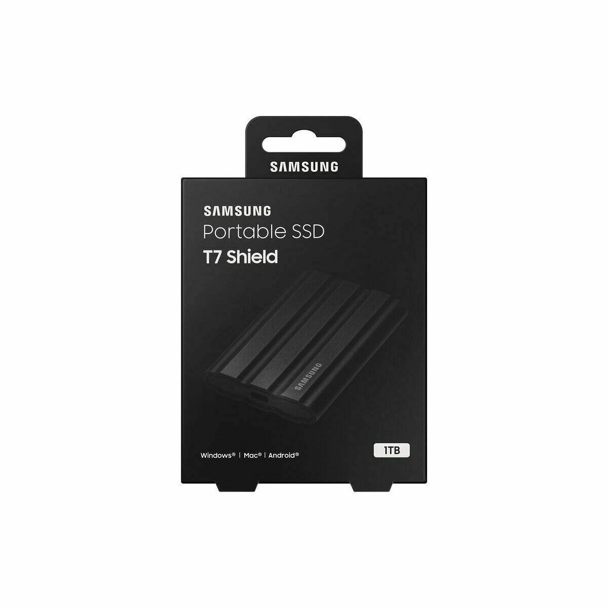 Tragbares SSD-Gehäuse, beschriftet mit ‚Samsung Portable SSD T7 Shield', 1 TB Kapazität, kompatibel mit Windows, Mac und Android.