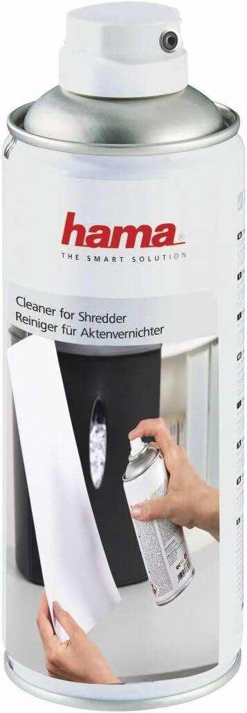Eine Hand sprüht den 'Reiniger für Aktenvernichter' von Hama auf einen Aktenvernichter, positioniert um die Klingen zu reinigen. Der deutsche Text wiederholt den Produktnamen.