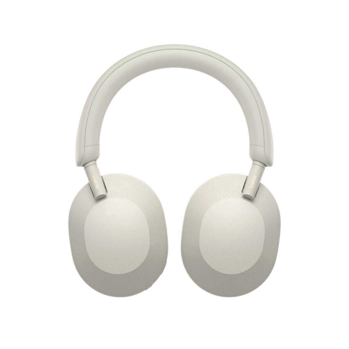 Weiße Over-Ear-Kopfhörer mit gepolsterten Ohrmuscheln und einem schlichten, minimalistischen Design, die auf einem einfarbigen Hintergrund platziert sind.