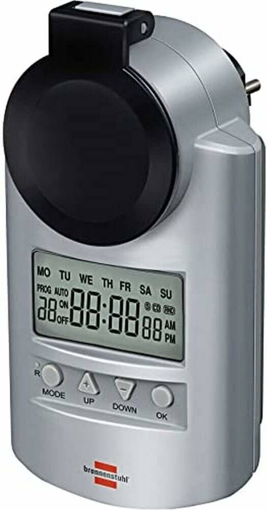 Eine digitale Stoppuhr mit einem großen kreisförmigen Zifferblatt ist in einem silbernen rechteckigen Gehäuse eingebaut und zeigt verschiedene Zeitmessoptionen sowie einen digitalen Bildschirm.