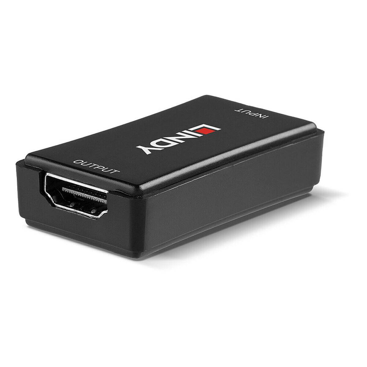 Ein kleiner rechteckiger HDMI-Adapter mit Beschriftung 'Eingang' und 'Ausgang'. Er ist schwarz und hat ein Markenlogo auf der Oberseite, wird zum Verbinden von Geräten verwendet.