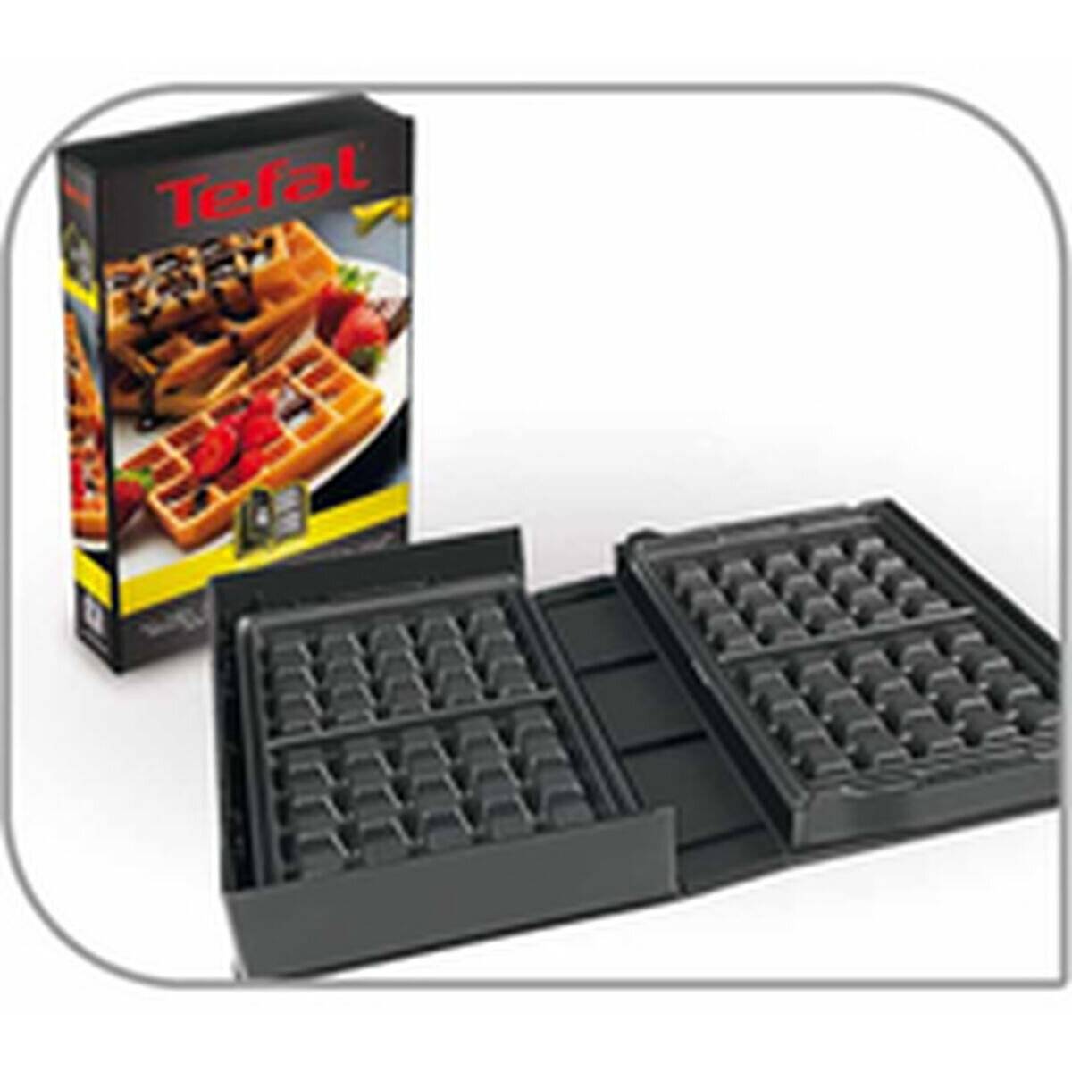 Waffeleisen-Set mit zwei antihaftbeschichteten Platten, einer Schachtel mit gekochten Waffeln mit Erdbeeren und Blaubeeren und dem Markennamen oben.