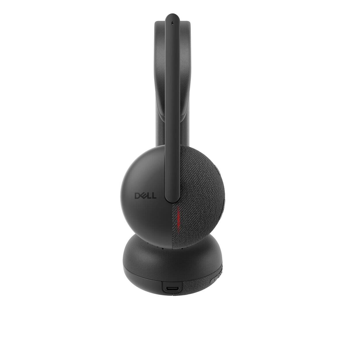 Ein schwarzes Dell-Wireless-Headset, das auf seinem Ständer ruht und von hinten betrachtet wird, wobei seine runde Ohrmuschel und das elegante Design zur Geltung kommen.
