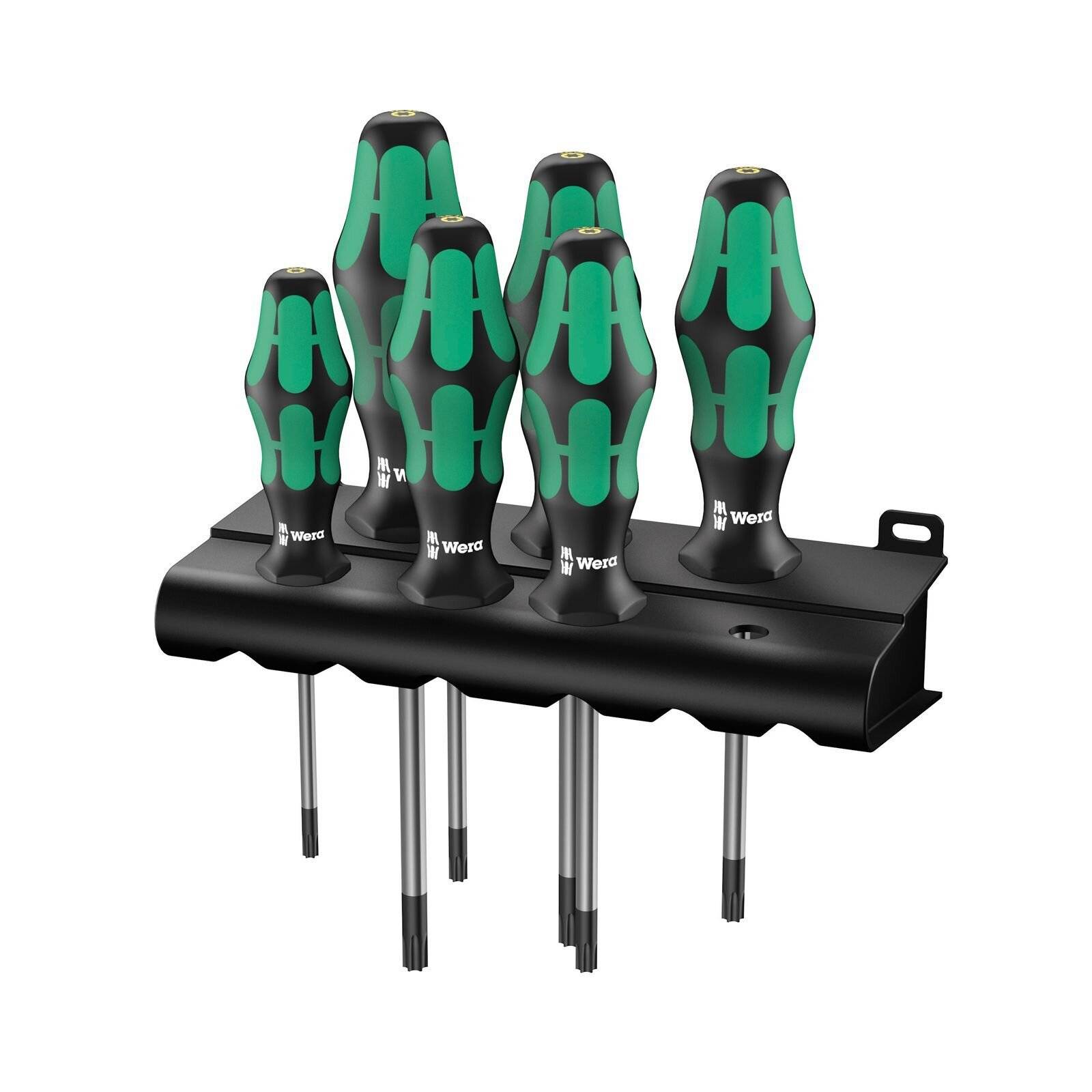 Sechs schwarze und grüne Schraubendreher in einem schwarzen Wandhalter, ausgestattet mit ergonomischen Griffen und unterschiedlichen Größen für verschiedene Schraubentypen.